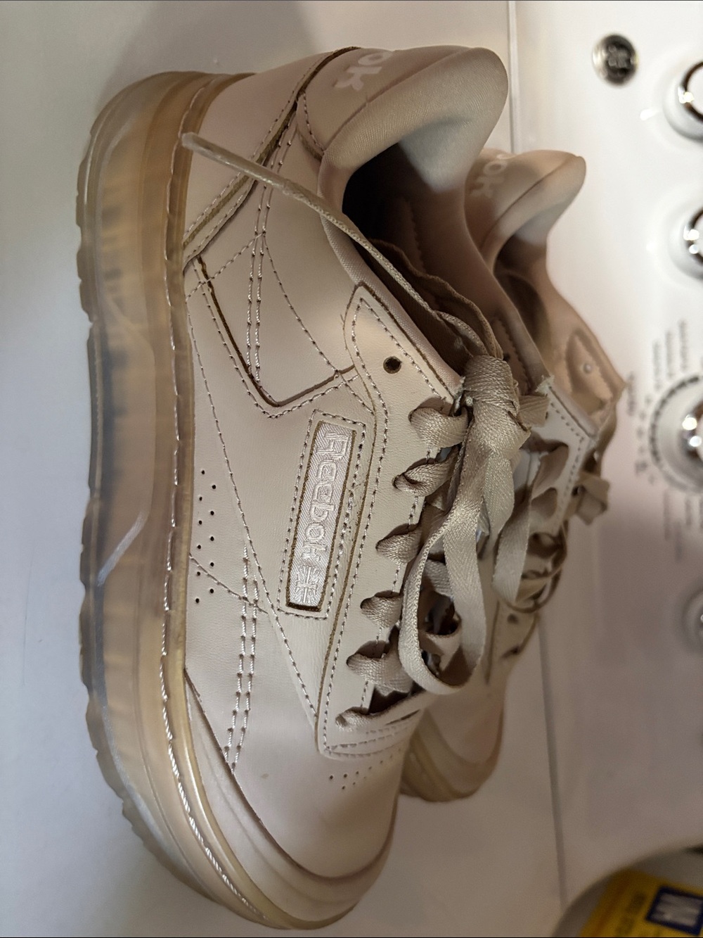 Reebok Women’s Beige Leather Sneakers with Clear Sole